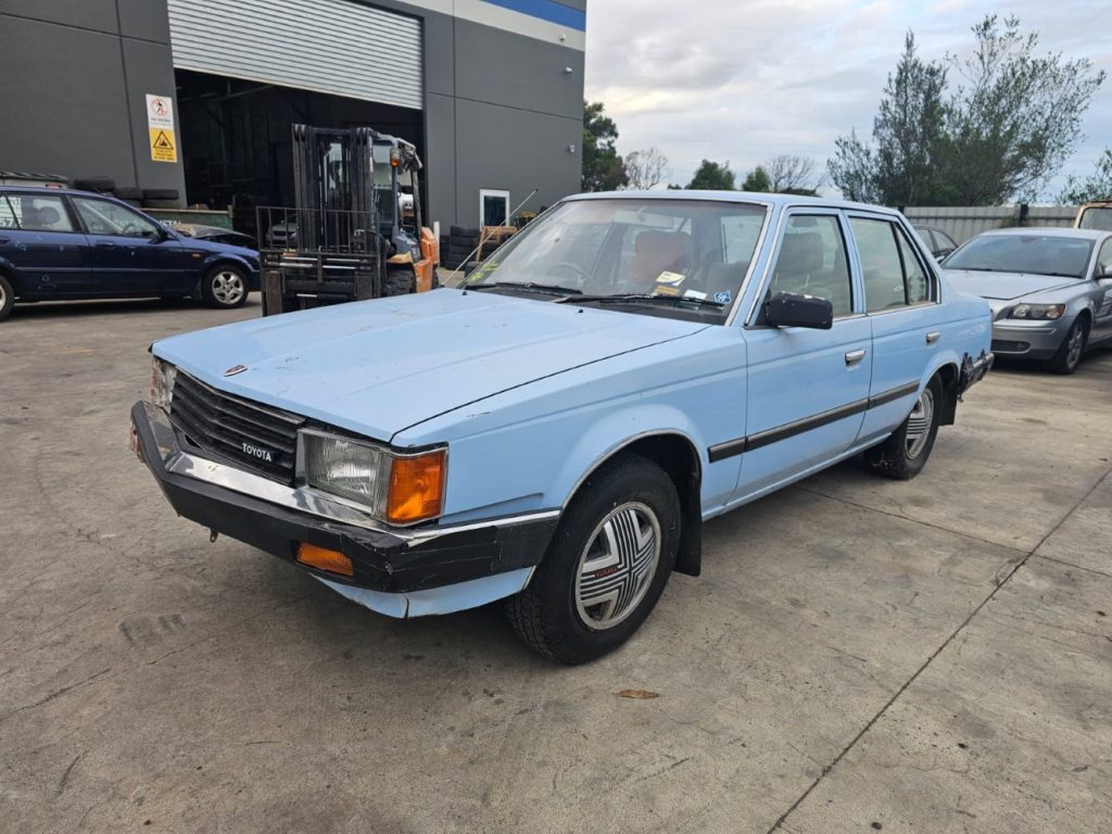 Car Wreckers - Toyota Corona 1984 Blue Auto Petrol