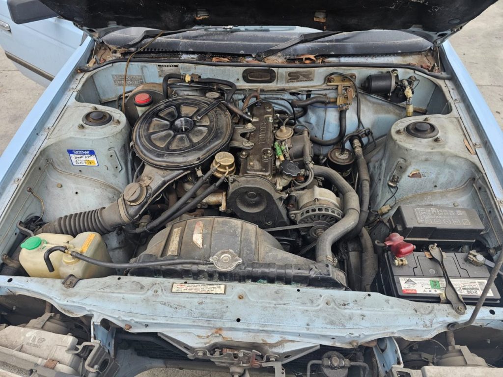 Car Wreckers - Toyota Corona 1984 Blue Auto Petrol