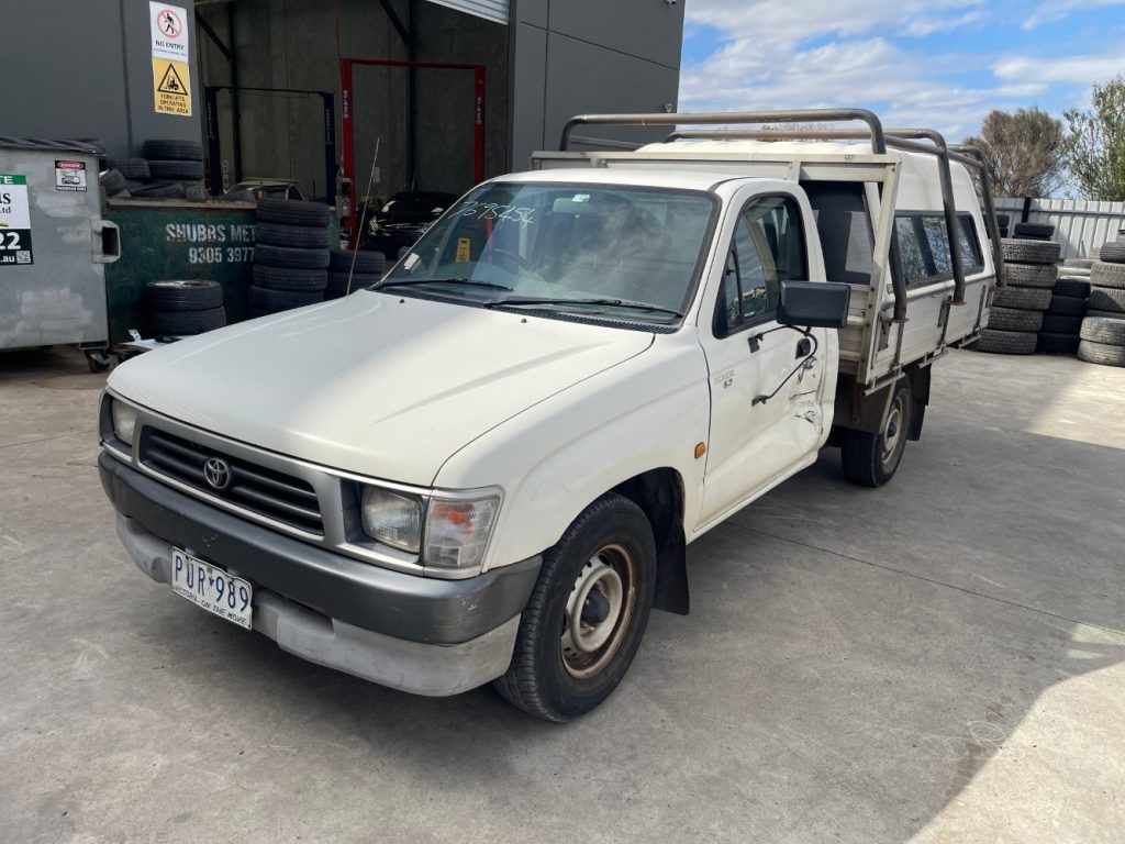 Car Wreckers - Toyota Hilux 1999 White Manual Manual