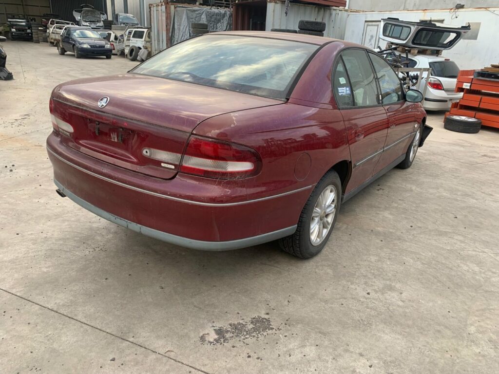 Car Wreckers - Holden Commodore 2000 Red Auto Petrol