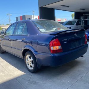 Car Wreckers - Mazda 323 2000 Blue Auto Petrol