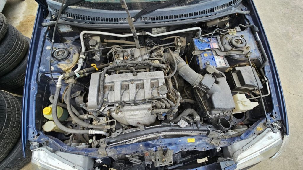 Car Wreckers - Mazda 323 2000 Blue Auto Petrol