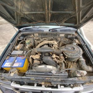 Car Wreckers - Toyota Hilux 2000 Green Manual Petrol
