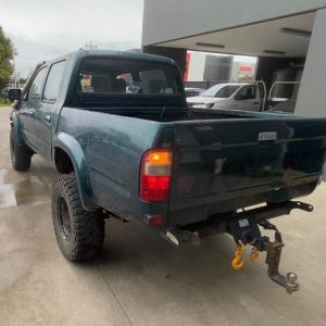 Car Wreckers - Toyota Hilux 2000 Green Manual Petrol