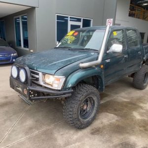 Car Wreckers - Toyota Hilux 2000 Green Manual Petrol