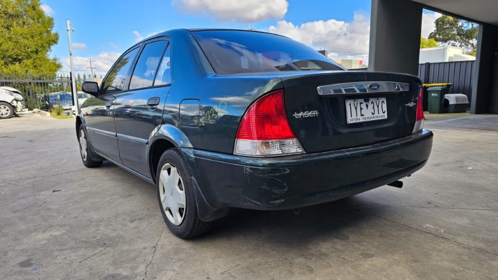 Car Wreckers - Ford Laser 2001 Green Auto Petrol