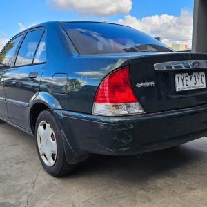 Car Wreckers - Ford Laser 2001 Green Auto Petrol