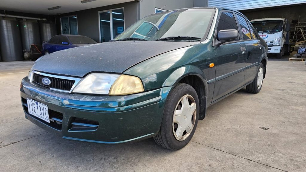 Car Wreckers - Ford Laser 2001 Green Auto Petrol