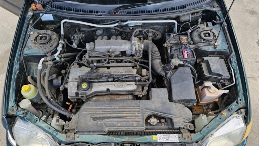 Car Wreckers - Ford Laser 2001 Green Auto Petrol