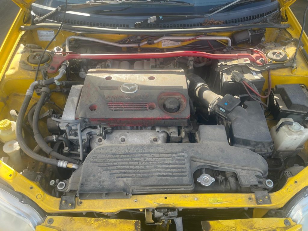 Car Wreckers - Mazda 323 2001 Yellow Auto Petrol