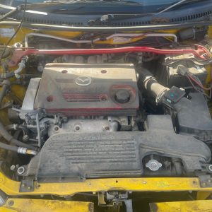 Car Wreckers - Mazda 323 2001 Yellow Auto Petrol