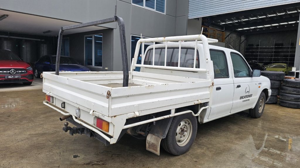 Car Wreckers - Ford Courier 2002 White Auto Petrol
