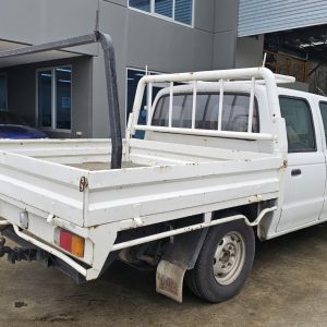 Car Wreckers - Ford Courier 2002 White Auto Petrol