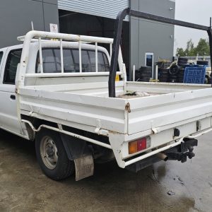 Car Wreckers - Ford Courier 2002 White Auto Petrol