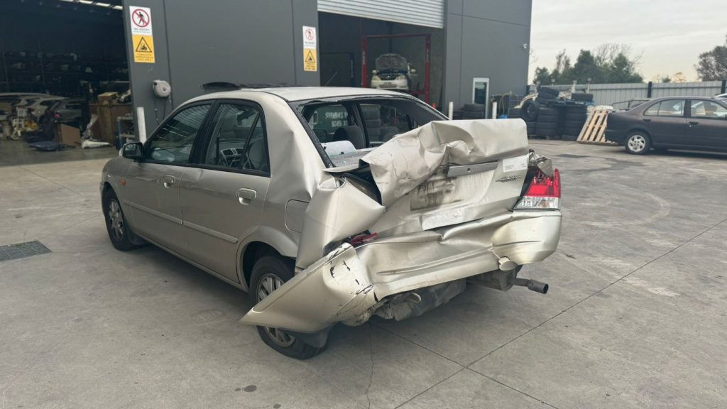 Car Wreckers - Ford Laser 2002 Gold Auto Petrol