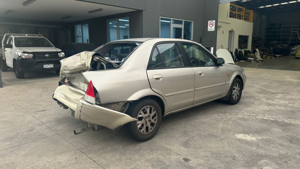 Car Wreckers - Ford Laser 2002 Gold Auto Petrol