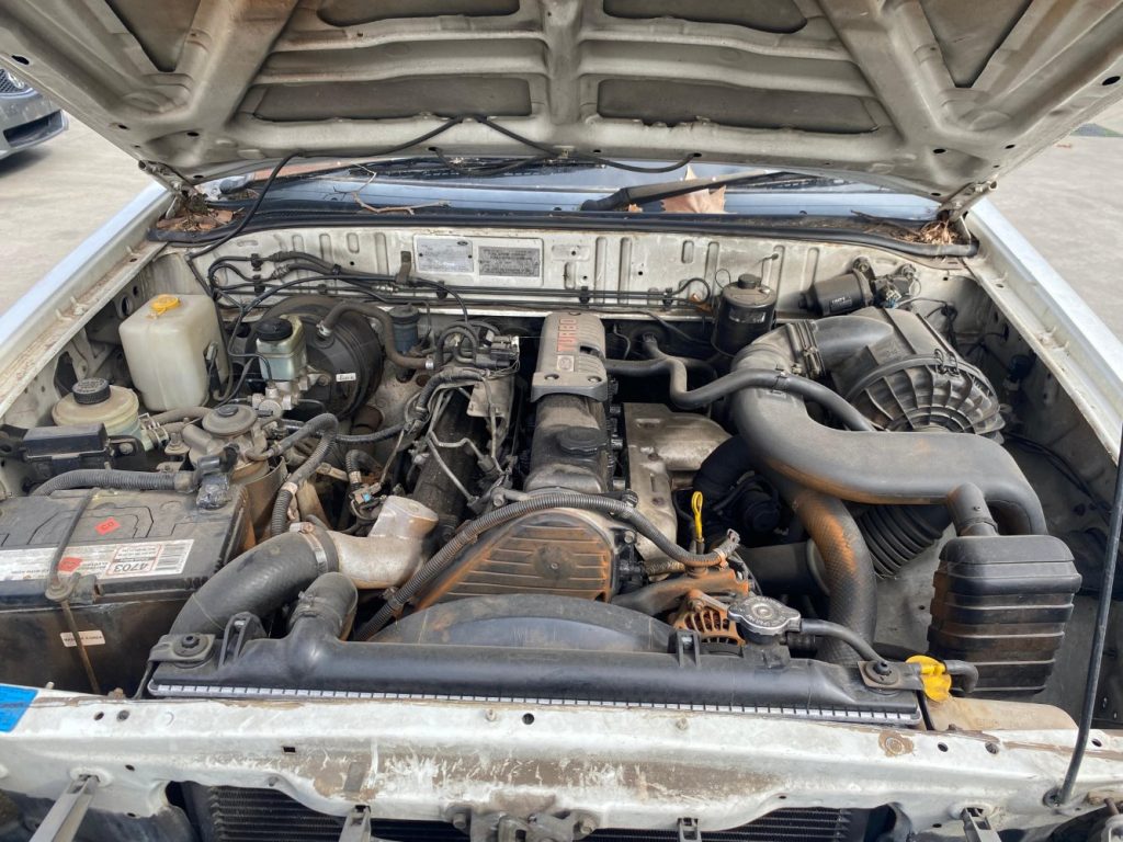 Car Wreckers - Ford Courier 2002 White Auto Petrol