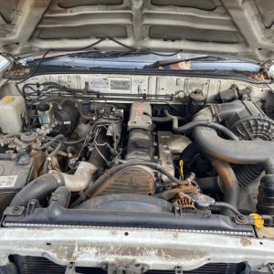 Car Wreckers - Ford Courier 2002 White Auto Petrol