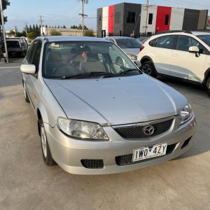 Car Wreckers - Mazda 323 2002 Silver Auto Petrol