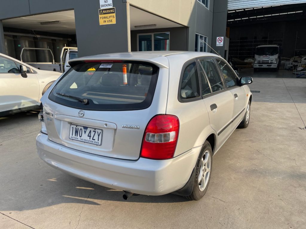 Car Wreckers - Mazda 323 2002 Silver Auto Petrol