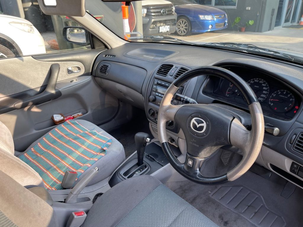 Car Wreckers - Mazda 323 2002 Silver Auto Petrol