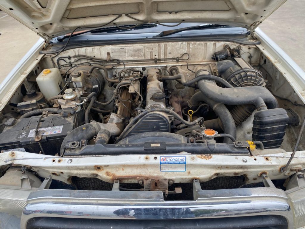 Car Wreckers - Mazda Bravo 2002 White Auto Petrol