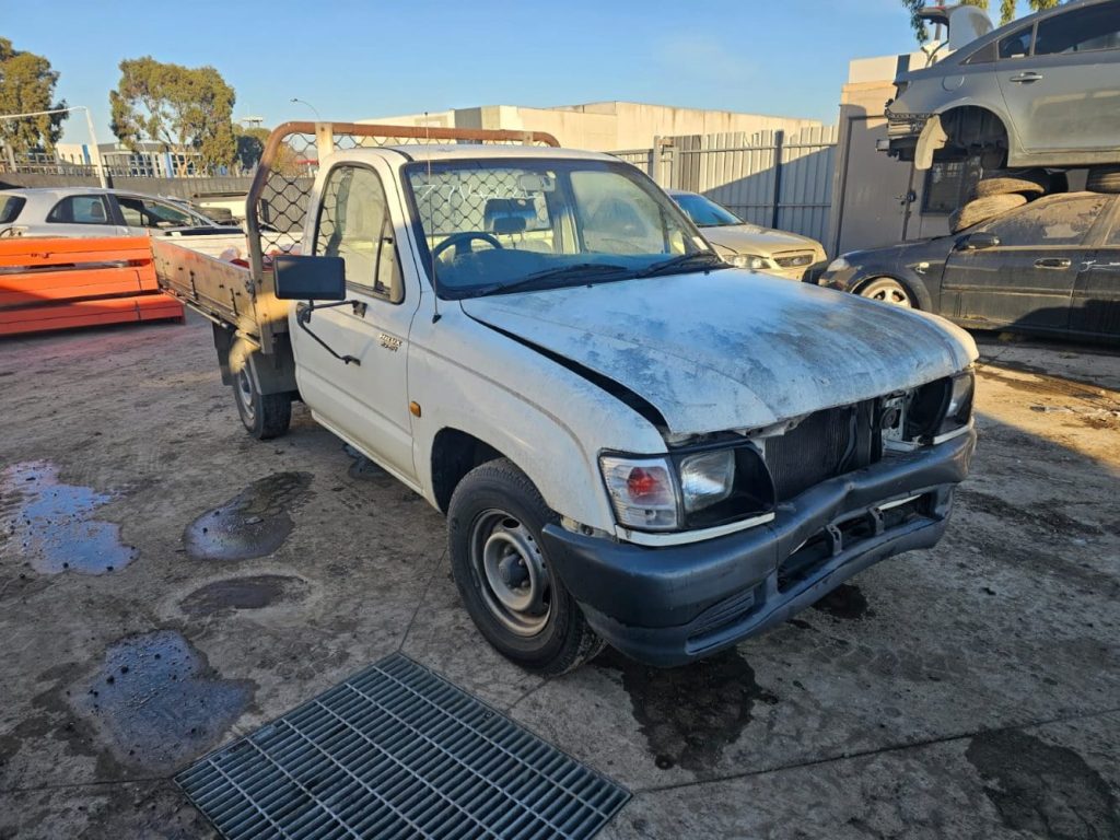 Car Wreckers - Toyota Hilux 2002 White Manual Petrol