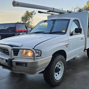 Car Wreckers - Mazda Bravo 2003 White Auto Petrol