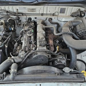 Car Wreckers - Mazda Bravo 2003 White Auto Petrol