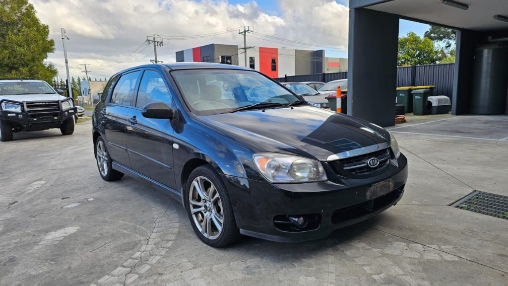 Car Wreckers - Kia Cerato 2006 Black Auto Petrol