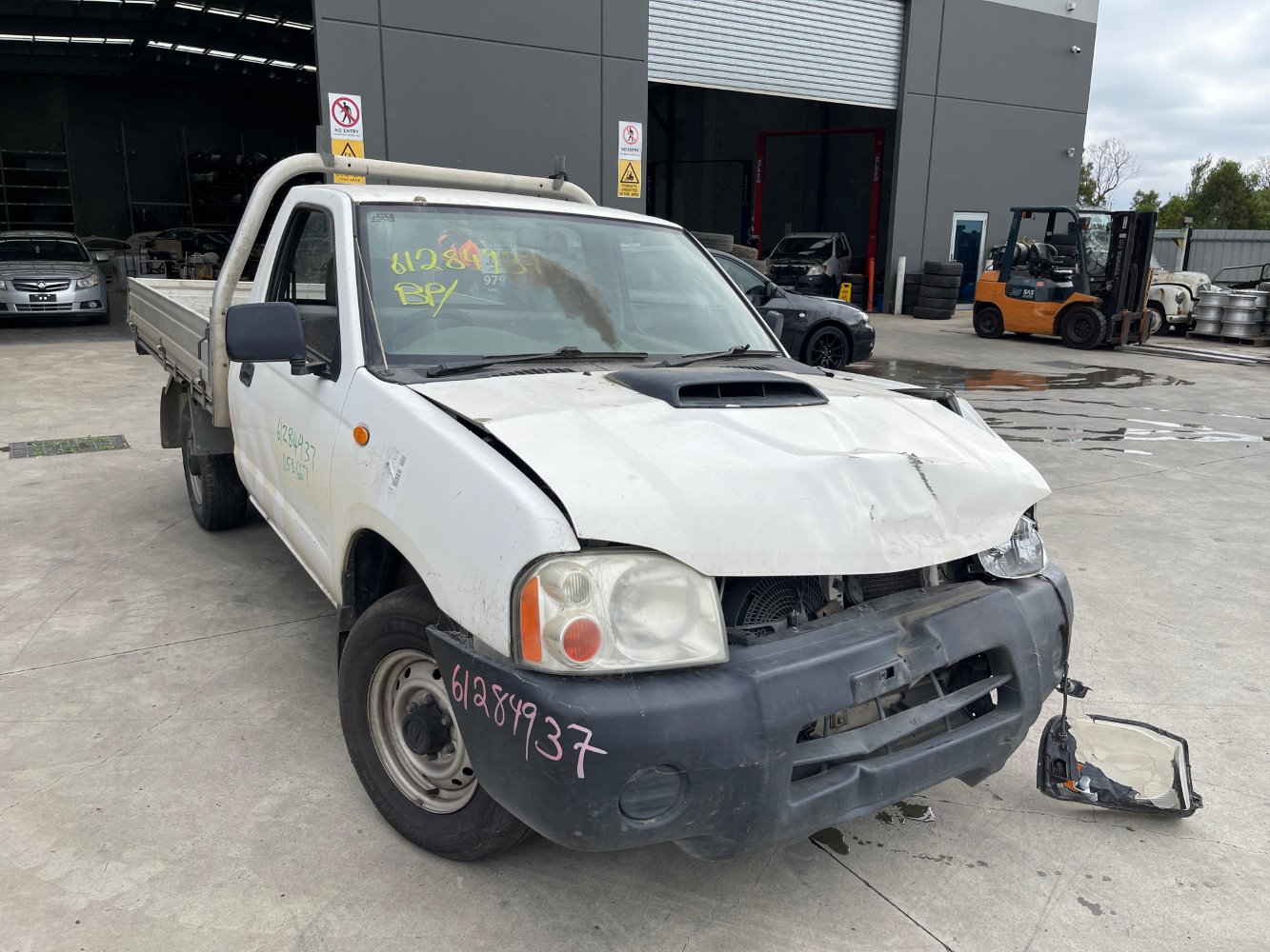 Car Wreckers - Nissan Navara 2009 White Manual Diesel