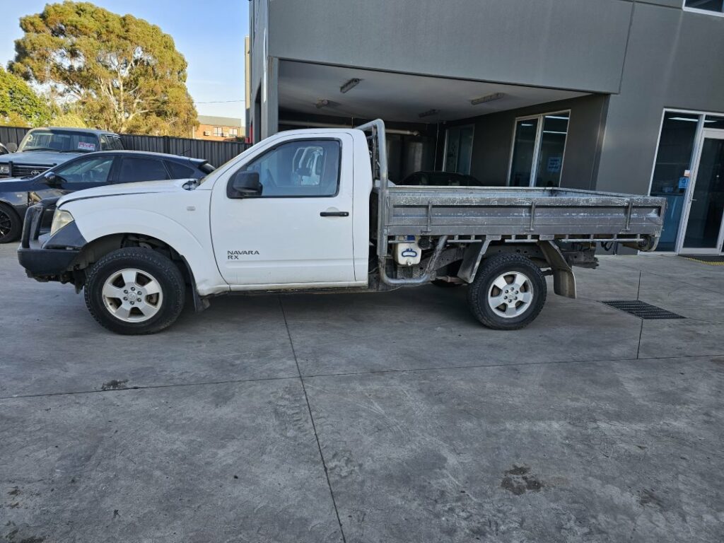 Car Wreckers - Nissan Navara 2009 White Manual Diesel - Car Parts, Used Parts, Auto Parts