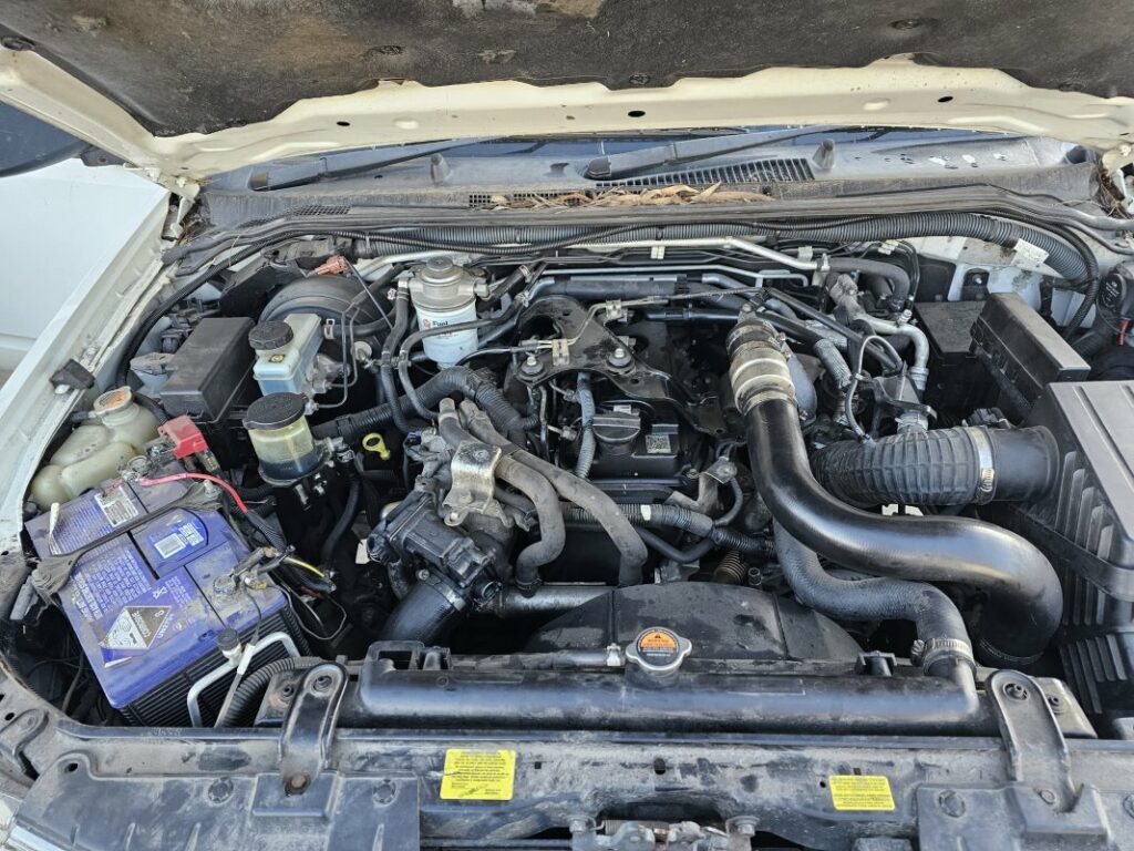 Car Wreckers - Nissan Navara 2009 White Manual Diesel - Car Parts, Used Parts, Auto Parts