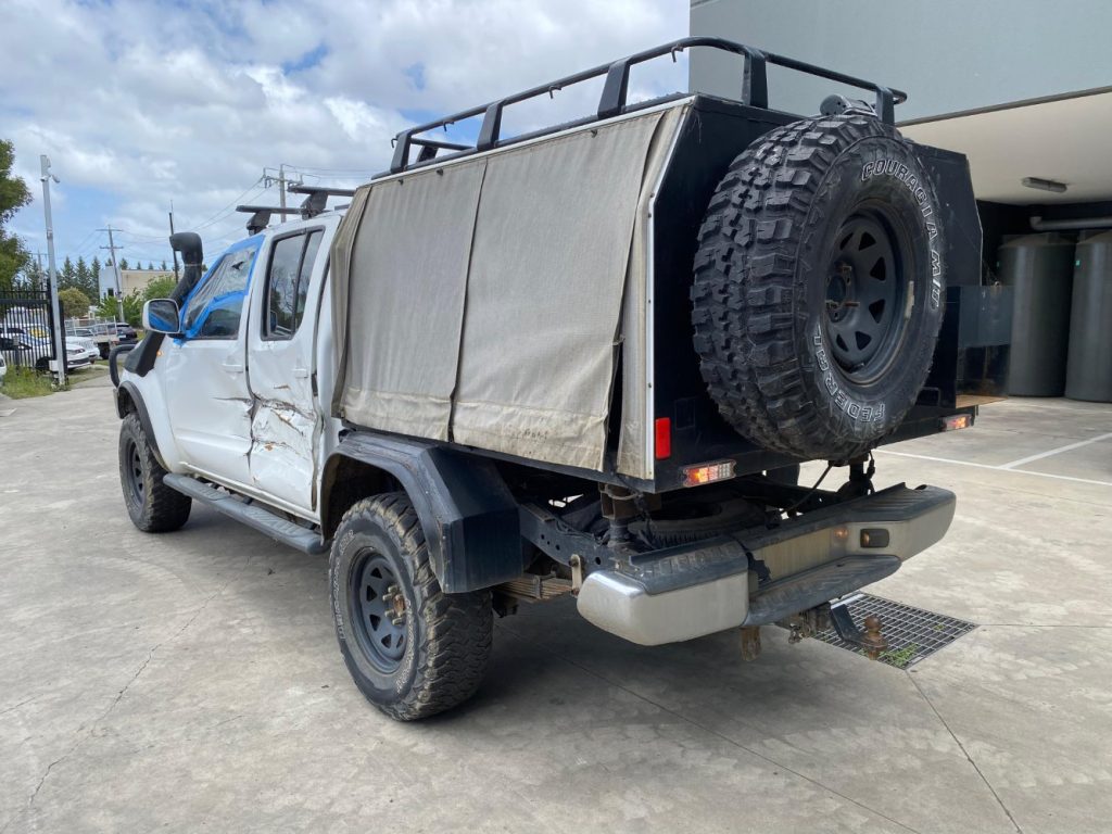 Car Wreckers - Nissan Navara 2010 White Manual Diesel