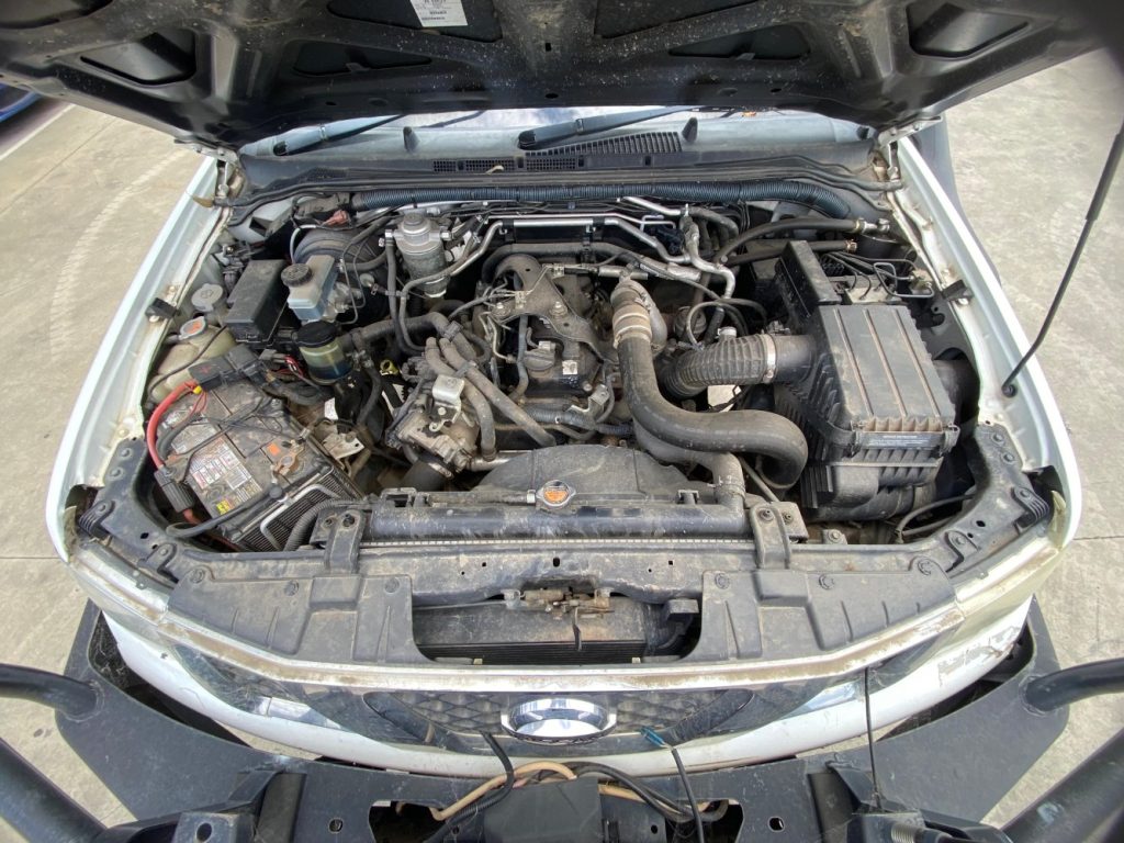 Car Wreckers - Nissan Navara 2010 White Manual Diesel