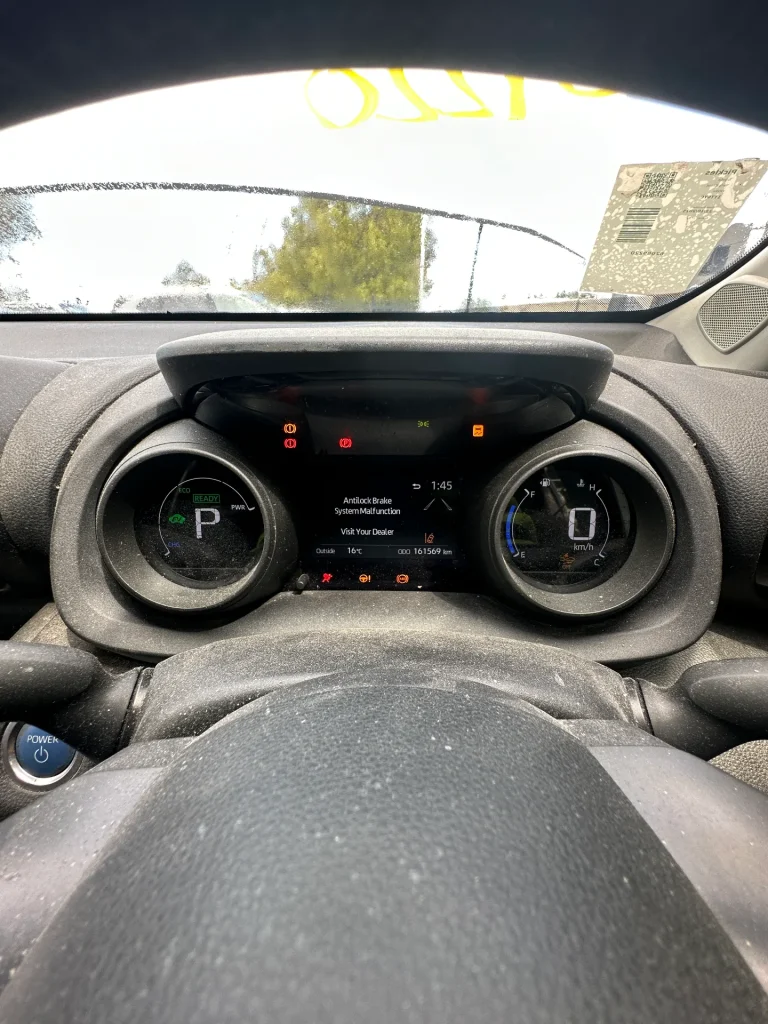 Toyota Yaris 2021 White Auto Petrol-Electric