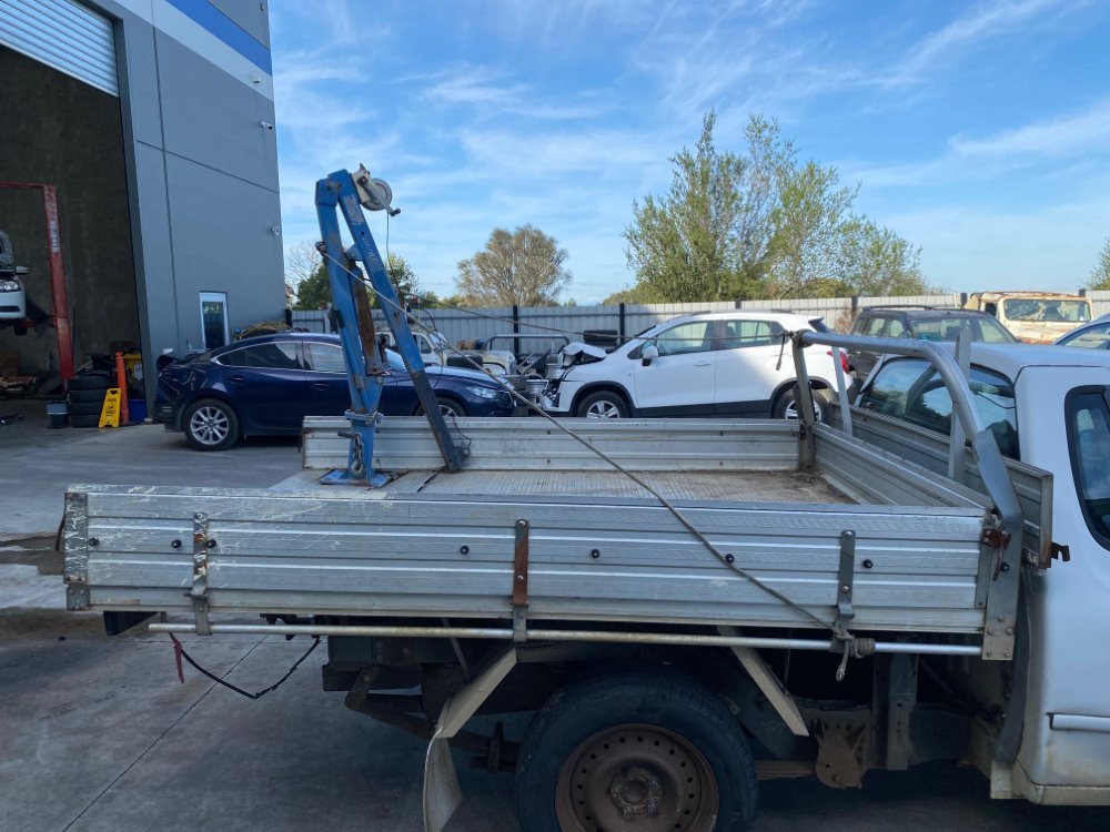 Car Wreckers - Ford Falcon 2005 White Auto Petrol