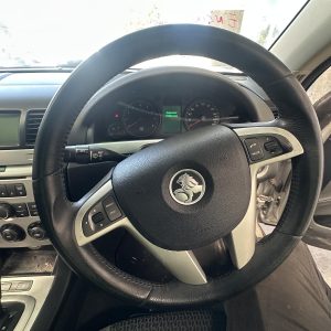 HOLDEN COMMODORE VE 08/2006-08/2009 STEERING WHEEL LEATHER SILVER SPOKE TYPE