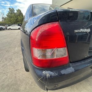 MAZDA 323 BJ 09/1998-12/2003 LEFT TAILLIGHT KOITO LENS 220-61866 P/N BN1C51160