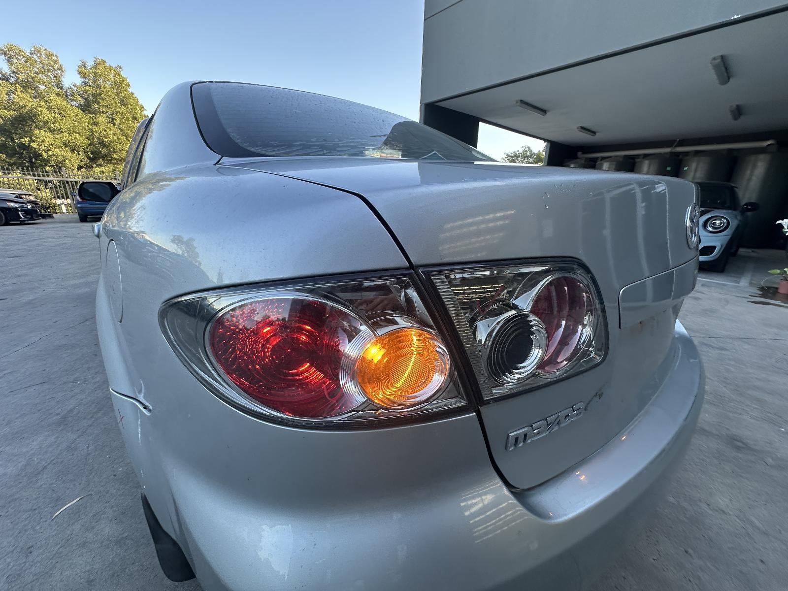 MAZDA 6 2005-2007 LEFT TAILLIGHT GG/GY, SEDAN/HATCH, LENS# 220-61980, 08/05-11/0