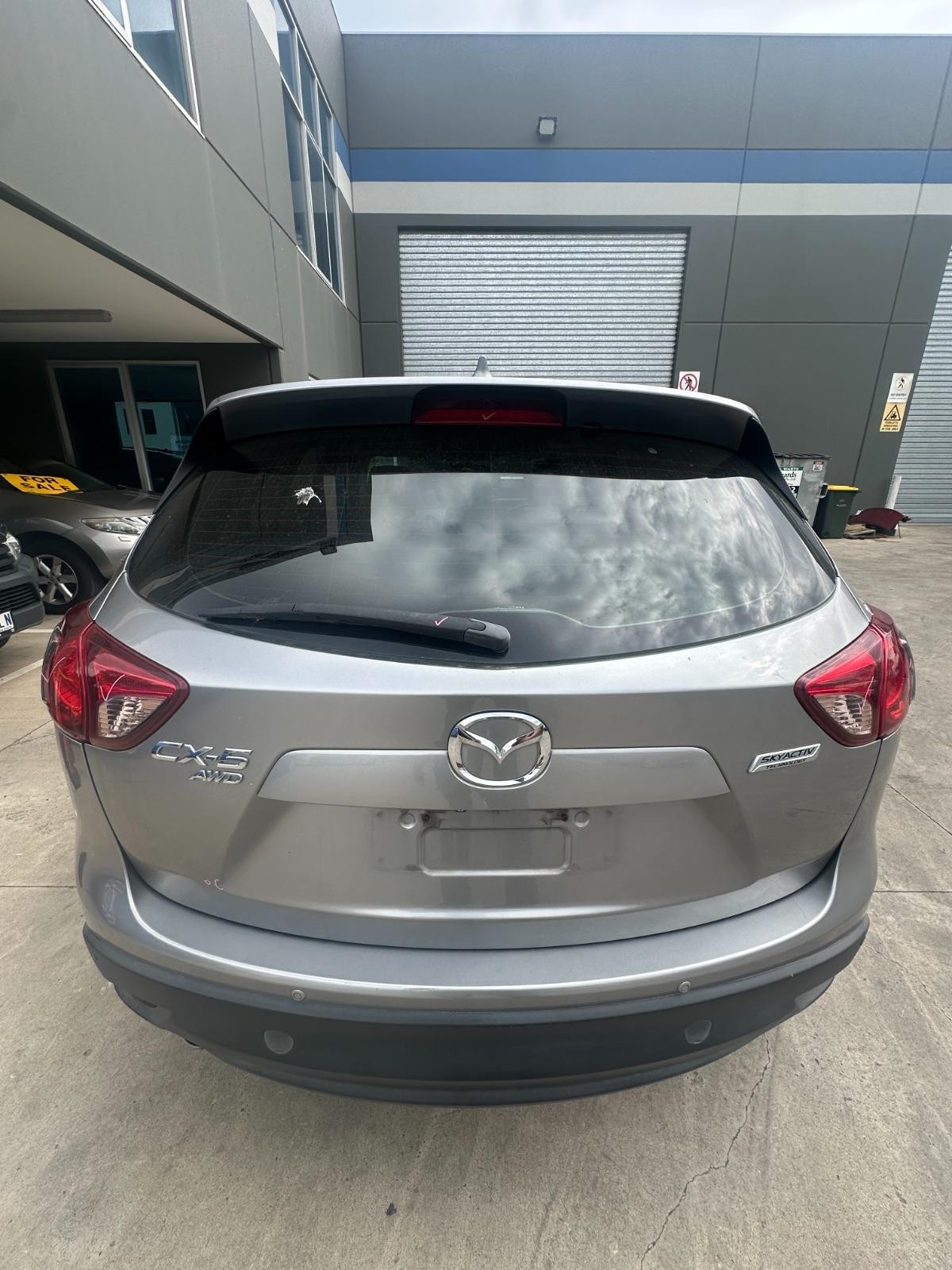 MAZDA CX5 KE 02/2012-12/2016 CENTRE REAR TAILGATE GARNISH WITH REV CAMERA
