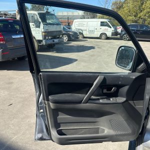 MITSUBISHI PAJERO NP 11/2002-09/2006 LEFT FRONT DOOR TRIM BLACK LEATHER