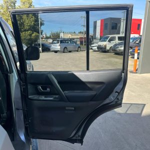 MITSUBISHI PAJERO NP 11/2002-09/2006 RIGHT REAR DOOR TRIM BLACK LEATHER