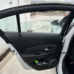 HOLDEN CRUZE 03/2011-01/2017 SEDAN DOOR TRIM LEFT HAND REAR, JH,CLOTH, CD/EQUIPE