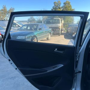 HYUNDAI ACCENT RB 05/2011-12/2019 LEFT REAR DOOR TRIM CLOTH BLACK HATCHBACK