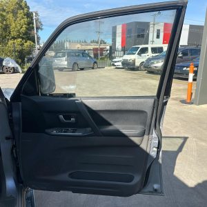 MITSUBISHI PAJERO NP 11/2002-09/2006 RIGHT FRONT DOOR TRIM BLACK LEATHER