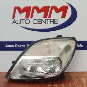 RENAULT SCENIC RIGHT HEADLAMP J64, SILVER REFLECTOR SURROUND TYPE, 05/01-12/04 0