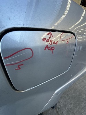 FORD LASER KN-KQ 02/1999-09/2002 FUEL DOOR / FILLER