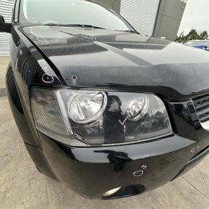 FORD TERRITORY SX-SY MKI 05/2004-04/2009 RIGHT HEADLAMP BLACK INSERT SY213005A