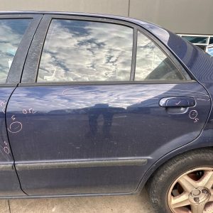 MAZDA 323 BJ 09/1998-12/2003 LEFT REAR DOOR WINDOW GREEN TINT TYPE SEDAN
